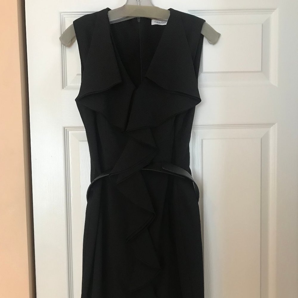 Black dress with ruffles, knee length